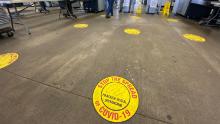 Six-foot markers for social distancing have been painted at UPS&#39;s Worldport facility in Louisville.