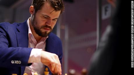 Carlsen competes against Daniil Dubov during the 82nd Tata Steel Chess Tournament.