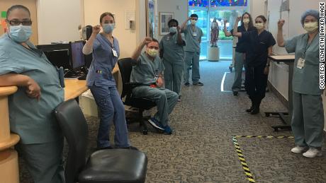 10 coronavirus-unit nurses are suspended, potentially for weeks, for refusing to work without N95 masks