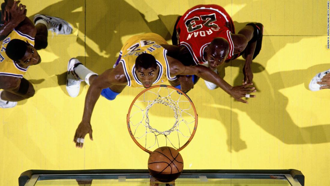 Jordan and Magic Johnson battle for a rebound as the Bulls took on the Los Angeles Lakers during the 1991 NBA Finals.
