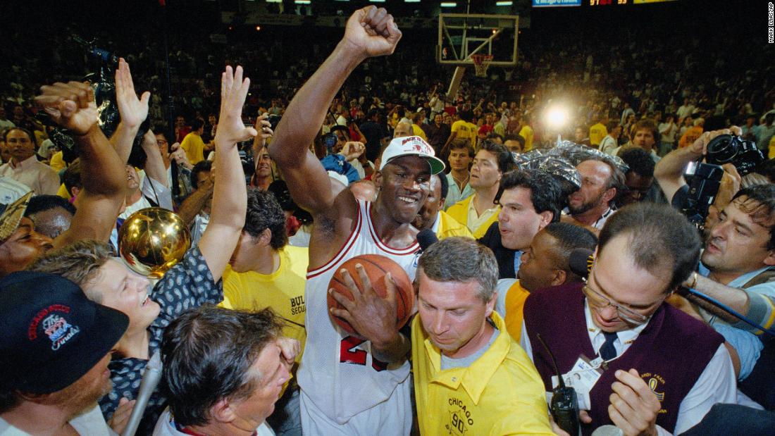 Jordan is surrounded by fans after the Bulls defeated Portland for their second straight title. Jordan was again named Finals MVP. In fact, he was Finals MVP in all six seasons that the Bulls won the title.