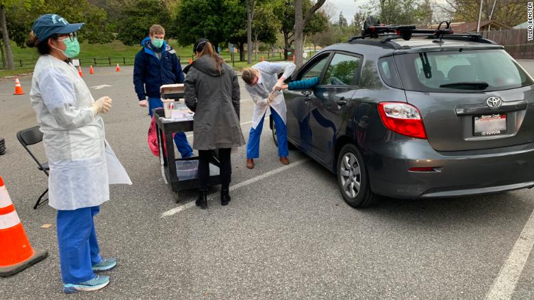 A participant has their blood taken in a drive-through Covid-19 antibody study in Santa Clara County, California.