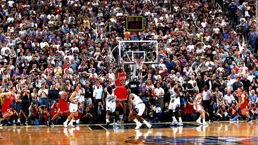 Jordan sinks a jumper over Utah&#39;s Bryon Russell to win the 1998 NBA Finals. It was his final shot with the Bulls.