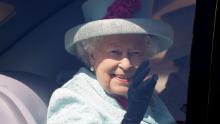 Britain's Queen Elizabeth II waves from her car after attending the Easter Mattins Service at St. George's Chapel, Windsor Castle on April 21, 2019. - Britain's Queen Elizabeth II celebrates her birthday on Sunday, marking 93 years in the public glare. (Photo by KIRSTY WIGGLESWORTH / POOL / AFP)        (Photo credit should read KIRSTY WIGGLESWORTH/AFP via Getty Images)