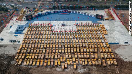 An aerial photo of trucks gathered at the ground-breaking ceremony of Guangzhou Evergrande&#39;s new stadium.