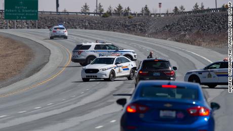 Police block the highway in Enfield, Nova Scotia on Sunday, April 19, 2020. Canadian police on Sunday arrested a suspect in an active shooter investigation after earlier saying he may have been driving a vehicle resembling a police car and wearing a police uniform. 