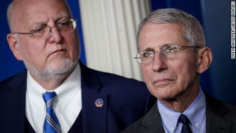 CDC Director Robert Redfield and Dr. Anthony Fauci, director of the National Institute of Allergy and Infectious Diseases, attend a briefing on the administration's coronavirus response. (Photo by Drew Angerer/Getty Images)