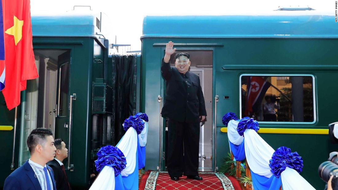 Kim waves before boarding a train in Lang Son, Vietnam, in March 2019.