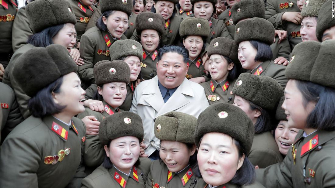 Kim is surrounded by troops in this undated photo released by the country&#39;s state-run news agency in November 2019.
