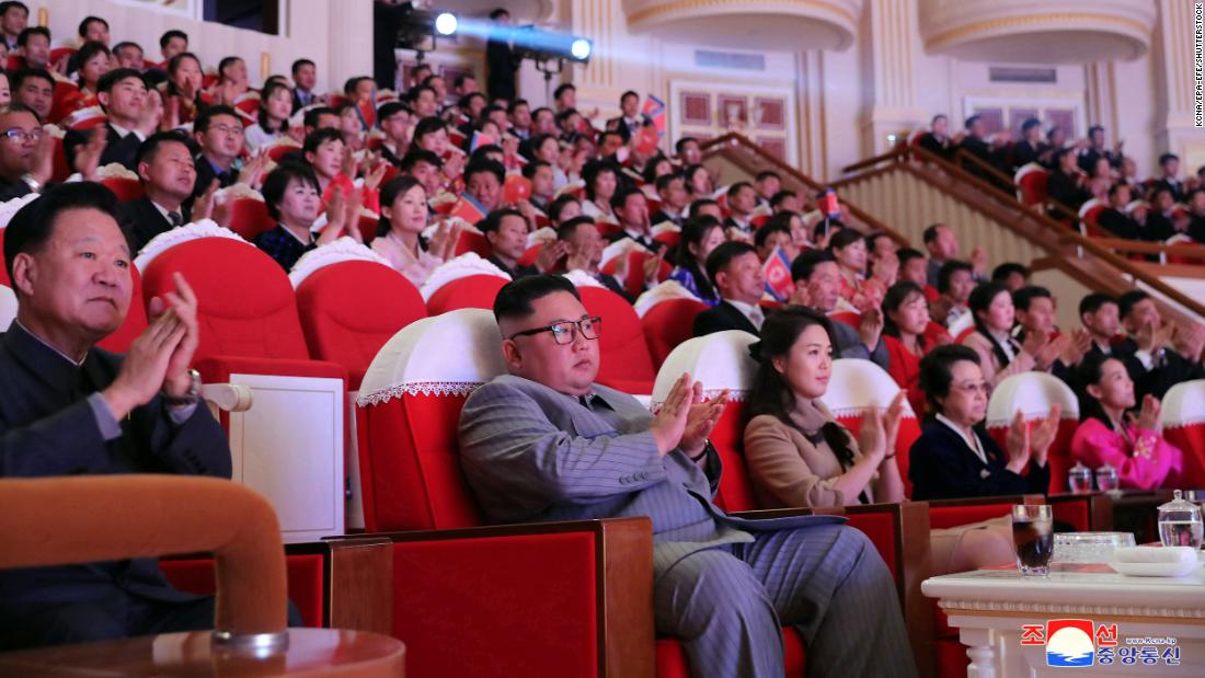 Kim and his wife watch a performance to celebrate the Lunar New Year in January 2020.