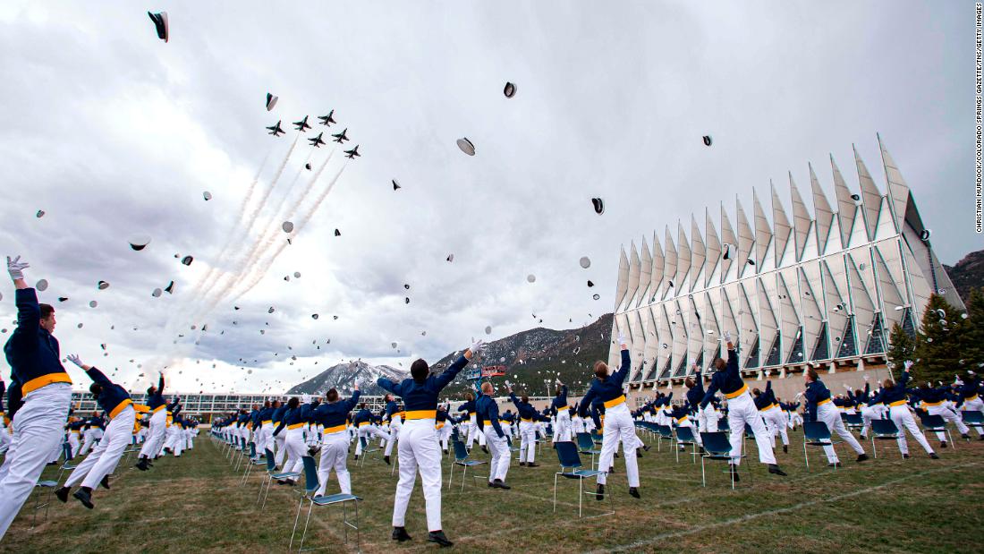 The class of 2020 tosses hats into the air at the &lt;a href=&quot;http://www.cnn.com/2020/04/18/politics/mike-pence-air-force-academy-commencement-speech/index.html&quot; target=&quot;_blank&quot;&gt;Air Force Academy graduation&lt;/a&gt; in Colorado Springs, Colorado.