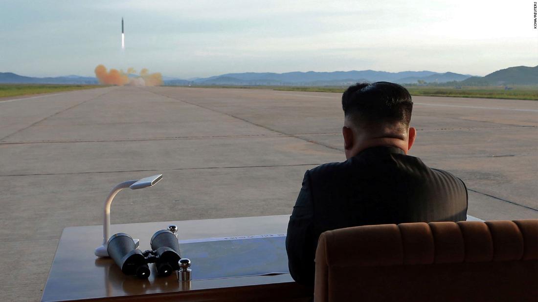 In this undated photo provided by North Korea&#39;s state-run news agency in September 2017, Kim watches the launch of what was said to be a Hwasong-12 missile.
