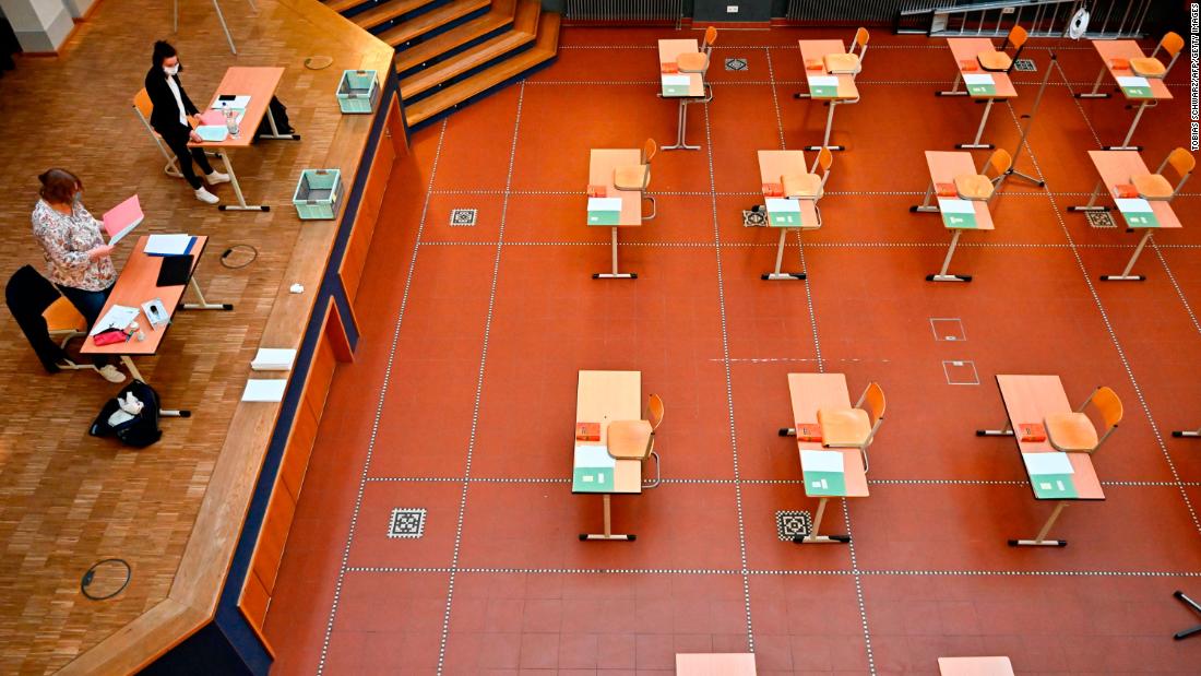 Biology teachers prepare to hold an exam at a secondary school in Berlin on April 22, 2020.