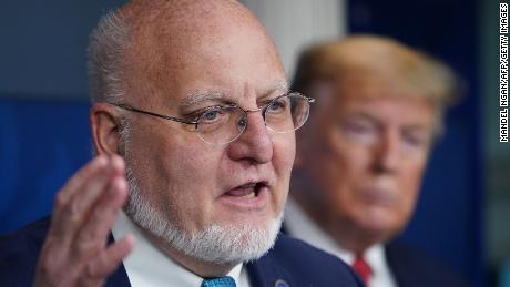 CDC Director Robert R. Redfield speaks as US President Donald Trump listens during the daily briefing on the novel coronavirus, which causes COVID-19, in the Brady Briefing Room of the White House on April 16, 2020, in Washington, DC. (Photo by MANDEL NGAN / AFP) (Photo by MANDEL NGAN/AFP via Getty Images)