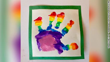 Prince Louis painted his own rainbow picture, using a hand print. 