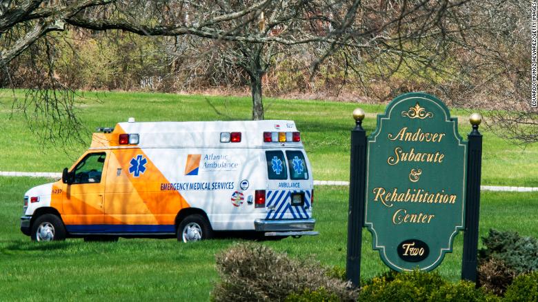 An ambulance departs Andover Subacute and Rehabilitation Center in Andover, New Jersey. (Eduardo Munoz Alvarez/Getty Images)