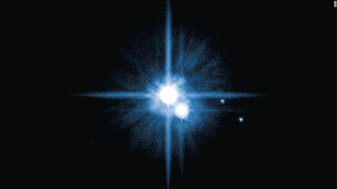 Hubble discovered four of Pluto&#39;s five moons. In 2005: Nix and Hydra were found. Hubble discovered Kerberos in 2011 and Styx in 2012. The new discoveries joined Pluto&#39;s large moon, Charon, which was discovered in 1978. Styx was found by scientists using Hubble to search for potential hazards for the New Horizons spacecraft which flew by Pluto in July 2015. Pluto is about 2.9 billion miles from Earth.