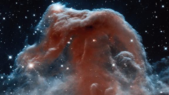 The iconic Horsehead Nebula is a favorite target for astronomers. Look carefully and you'll see what looks like the head of a horse rising into the stars. This Hubble image captures the nebula in infrared wavelengths. The nebula is 1,600 light-years from Earth.
