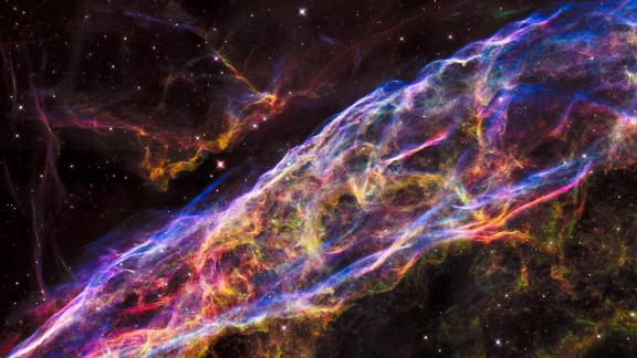 This is a detailed look at the section of a slowly expanding supernova, or the remains of an exploded star. Hubble took this image in 2015 of the Veil Nebula 2,100 light-years away. The star was once 20 times more massive than our sun, but only wisps of gas remain. 
