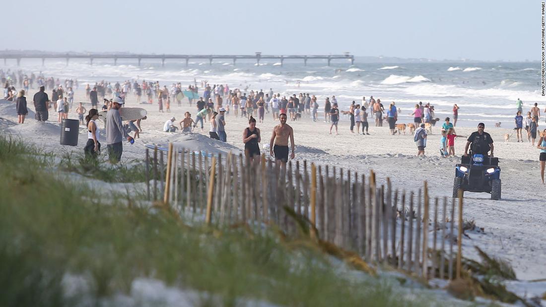 A beach is &lt;a href=&quot;https://www.cnn.com/2020/04/17/us/jacksonville-florida-beach-reopen/index.html&quot; target=&quot;_blank&quot;&gt;crowded with visitors&lt;/a&gt; in Jacksonville, Florida, after the city reopened its beaches on April 17.