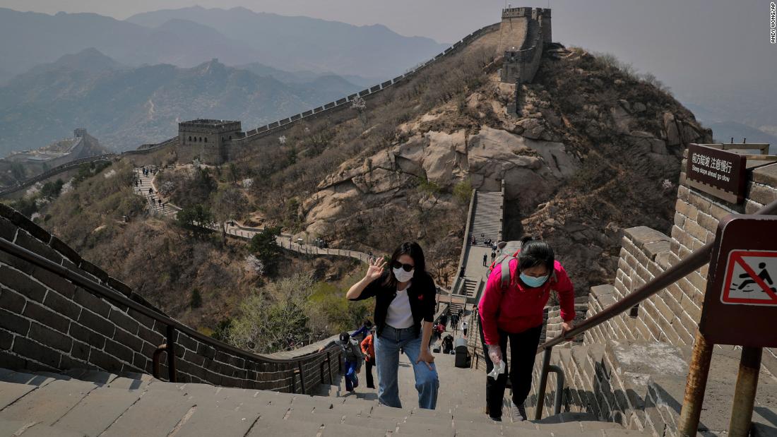 On April 14, people wearing protective face masks walk on a small stretch of the&lt;a href=&quot;https://www.cnn.com/travel/article/badaling-great-wall-china-reopens-intl-hnk/index.html&quot; target=&quot;_blank&quot;&gt; Great Wall of China&lt;/a&gt; that had been reopened.