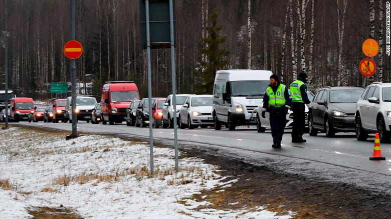 Cars at a traffic control post in Hyvinkaa, Finland, on April 15, during the lockdown of Uusimaa, the nation&#39;s most populous region.