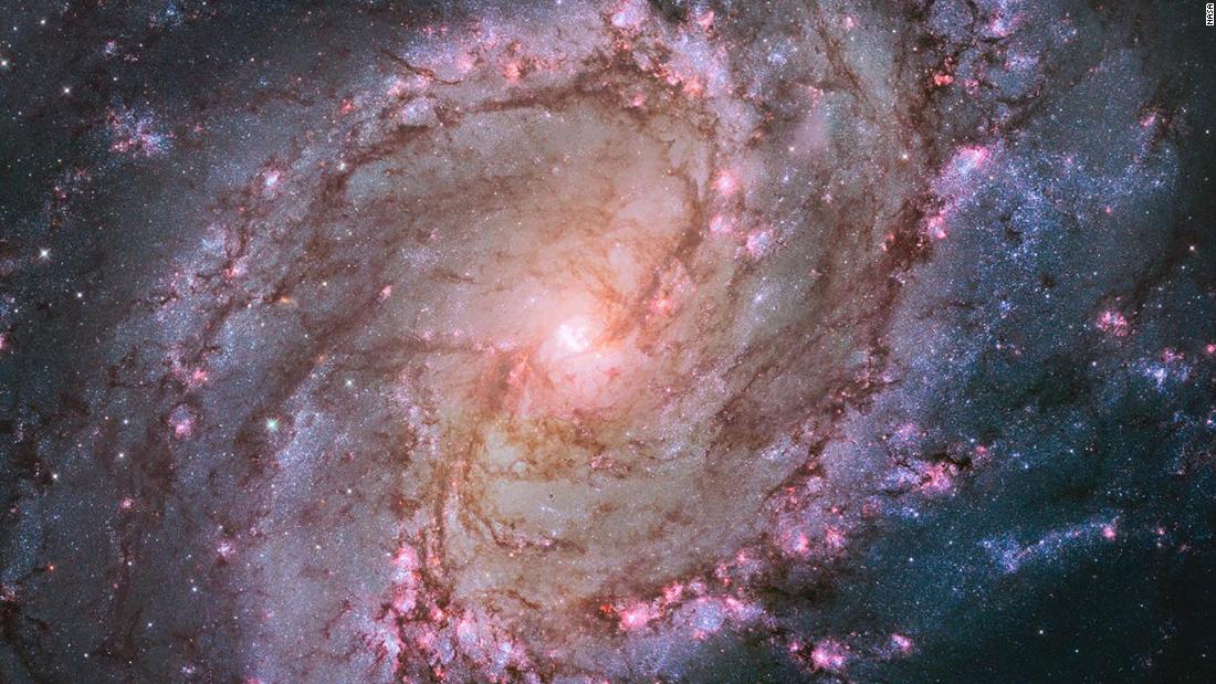 M83 is a nearby spiral galaxy, and this 2014 Hubble image showcases its thousands of clusters of stars and supernova remnants. The young stars can be seen in pink bubbles of hydrogen gas.