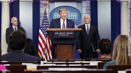 U.S. President Donald Trump, center, speaks during a news conference in the White House in Washington, D.C., U.S., on Friday, April 24, 2020. Trump has been determined to talk his way through the coronavirus crisis, but his frequent misstatements at his daily news conferences have caused a litany of public health and political headaches for the White House. Photographer: Chris Kleponis/Polaris/Bloomberg via Getty Images