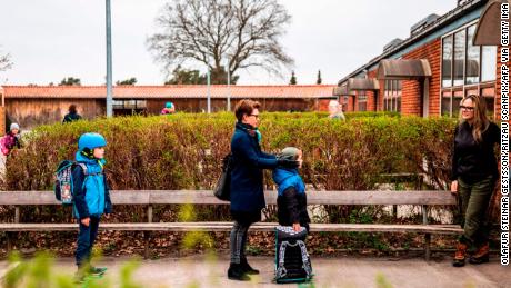 Students line up to return to school north of Copenhagen in Denmark, after the lockdown was eased. 