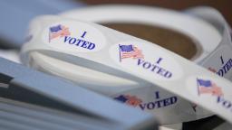 Early voting: Wisconsin opens in-person voting as Covid cases hit record-breaking spike
