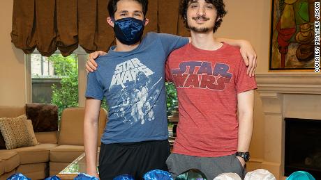 Matthew and Jeremy Jason plan to turn the hundreds of kippahs that were dropped off at Congregation Brith Shalom into face masks.