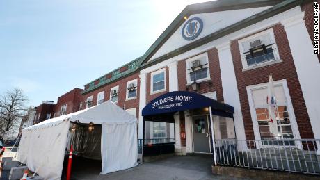 A tent sits idle beside the entrance to the Soldiers&#39; Home in Chelsea.