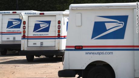 Postal Service says it has 'ample capacity' to handle election after Trump casts doubt