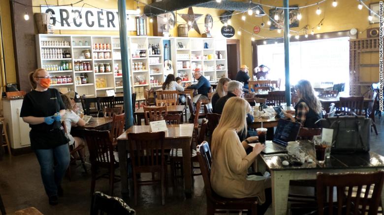 Customers at Puckett's Grocery &amp; Restaurant on Monday in Franklin, Tennessee, one of the first US states to reopen restaurants. 