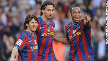 Henry with Lionel Messi (left) and Zlatan Ibrahimovic (middle) at Barcelona.