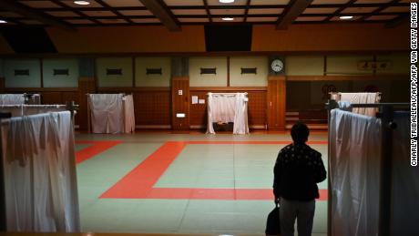 A man arrives to have to sleep at a shelter provided by Kanagawa prefecture for people who used to stay in internet cafes.