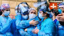 Medical workers hugged each other in front of Lenox Health Greenwich Village Thursday as New Yorkers applaud medical personnel and essential workers on the front line of the coronavirus pandemic.
