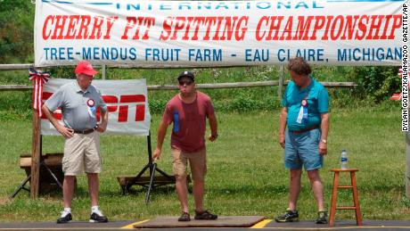 Participants competing in the 46th annual Cherry Pit-Spitting Championship.