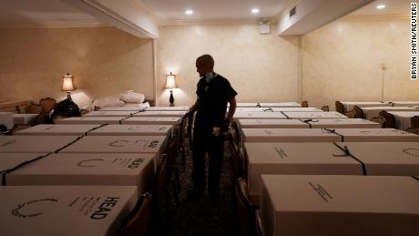 A second peak of coronavirus could lead to more preventable deaths. This New York funeral home, pictured in April, was already overwhelmed with the dead in the first wave of the disease.