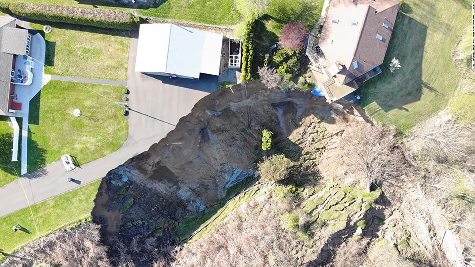 A landslide in New York state leaves homes dangling inches away from a