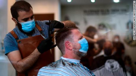 German hairdressers reopen after six weeks -- but in Berlin, you need to fill out a questionnaire to get a cut
