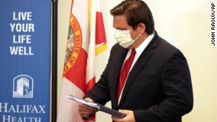 Florida governor claims coronavirus victory, but luck may have been a factor