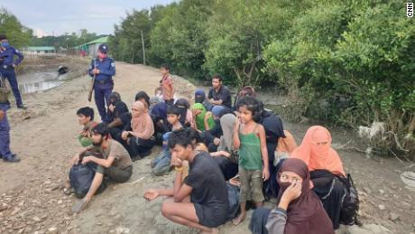 Dozens of refugees stranded at sea on isolated island 