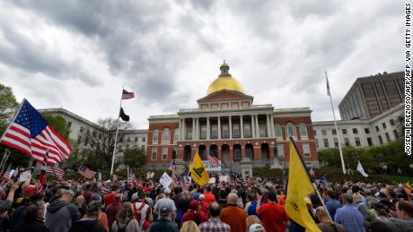 Protesters in Boston demand an end to Massacusetts&#39; stay at home advisory.