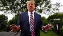 President Donald Trump speaks to members of the media on the South Lawn of the White House in Washington, Tuesday, May 5, 2020, before boarding Marine One for a short trip to Andrews Air Force Base, Md., and then on to Phoenix, Ariz. (AP Photo/Patrick Semansky)