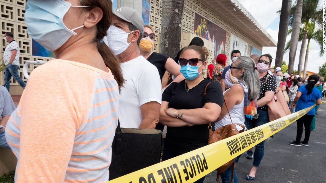 People line up to apply for unemployment benefits in Hialeah, Florida, after the state labor agency&#39;s website struggled to keep up with an influx of claims in early April.