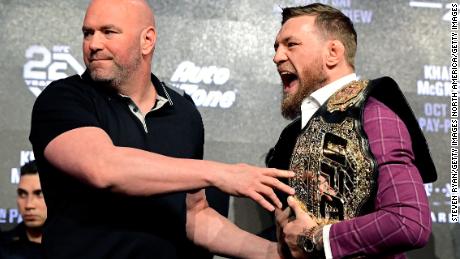 Conor McGregor is held back by UFC President Dana White during the UFC 229 Press Conference at Radio City Music Hall on September 20, 2018 in New York City.