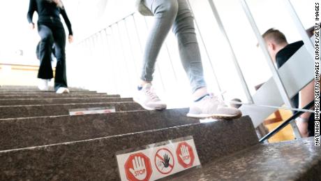 Signposting on stairs and in hallways help students in Ettlingen, Germany, keep their distance.