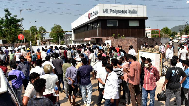 A crowd gathers outside the plant  after the leak.