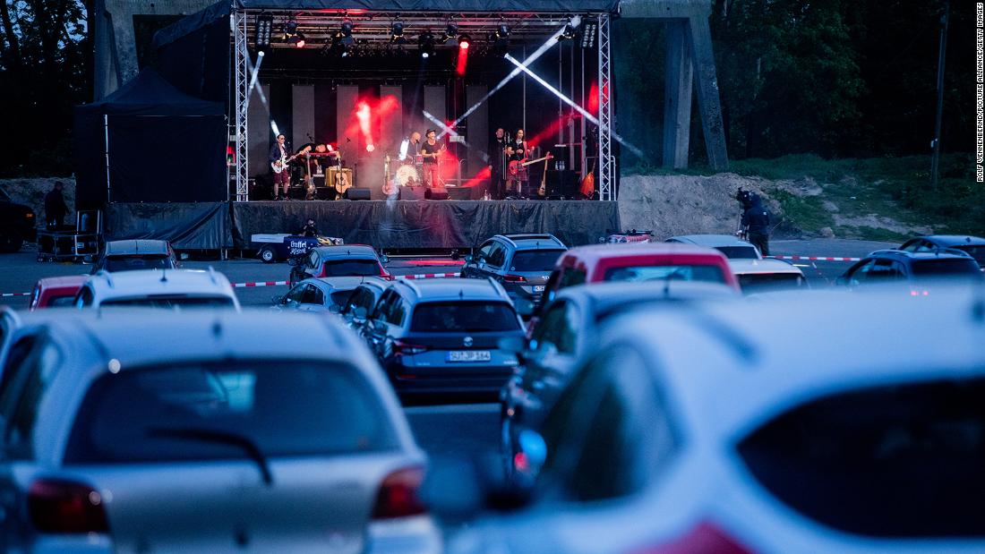 Brings, a local rock band, plays a live concert at a drive-in cinema in Cologne, Germany, on April 17. &lt;a href=&quot;https://www.euronews.com/2020/04/18/let-s-party-people-attend-german-concert-drive-in-cinema-style&quot; target=&quot;_blank&quot;&gt;According to Euronews,&lt;/a&gt; the concert was open to 250 vehicles.